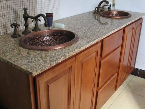 copper bathroom sink with faucet