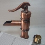 bronze bathroom basin faucet photo